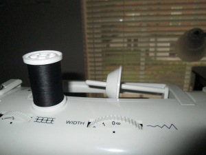 The first step for a beginner who's learning to sew is to put the thread on the sewing machine - Sew Me Your Stuff