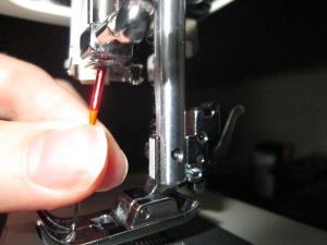 Inserting a sewing machine needle properly is important for any beginner learning to sew on a sewing machine - Sew Me Your Stuff