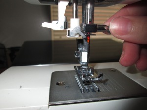 Inserting a sewing machine needle properly is important for any beginner learning to sew on a sewing machine - Sew Me Your Stuff
